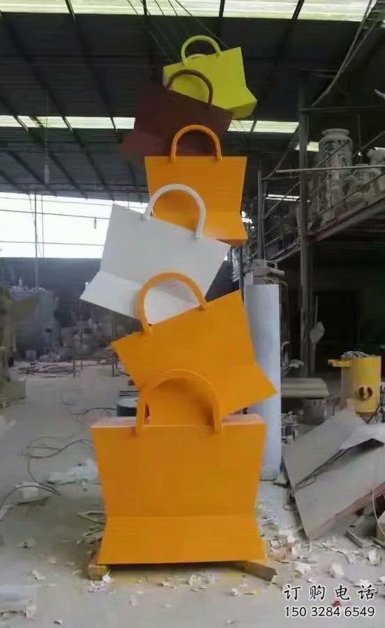 園林提包雕塑廠家 烤漆小品 中式不銹鋼提包雕塑制作